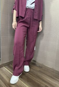 Pantalone in tessuto cupro MIMI'-MUA'